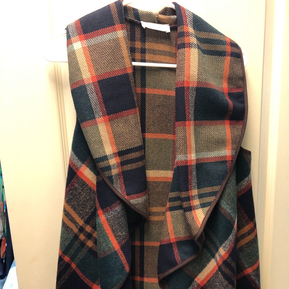Get ready for fall with this plaid vest!